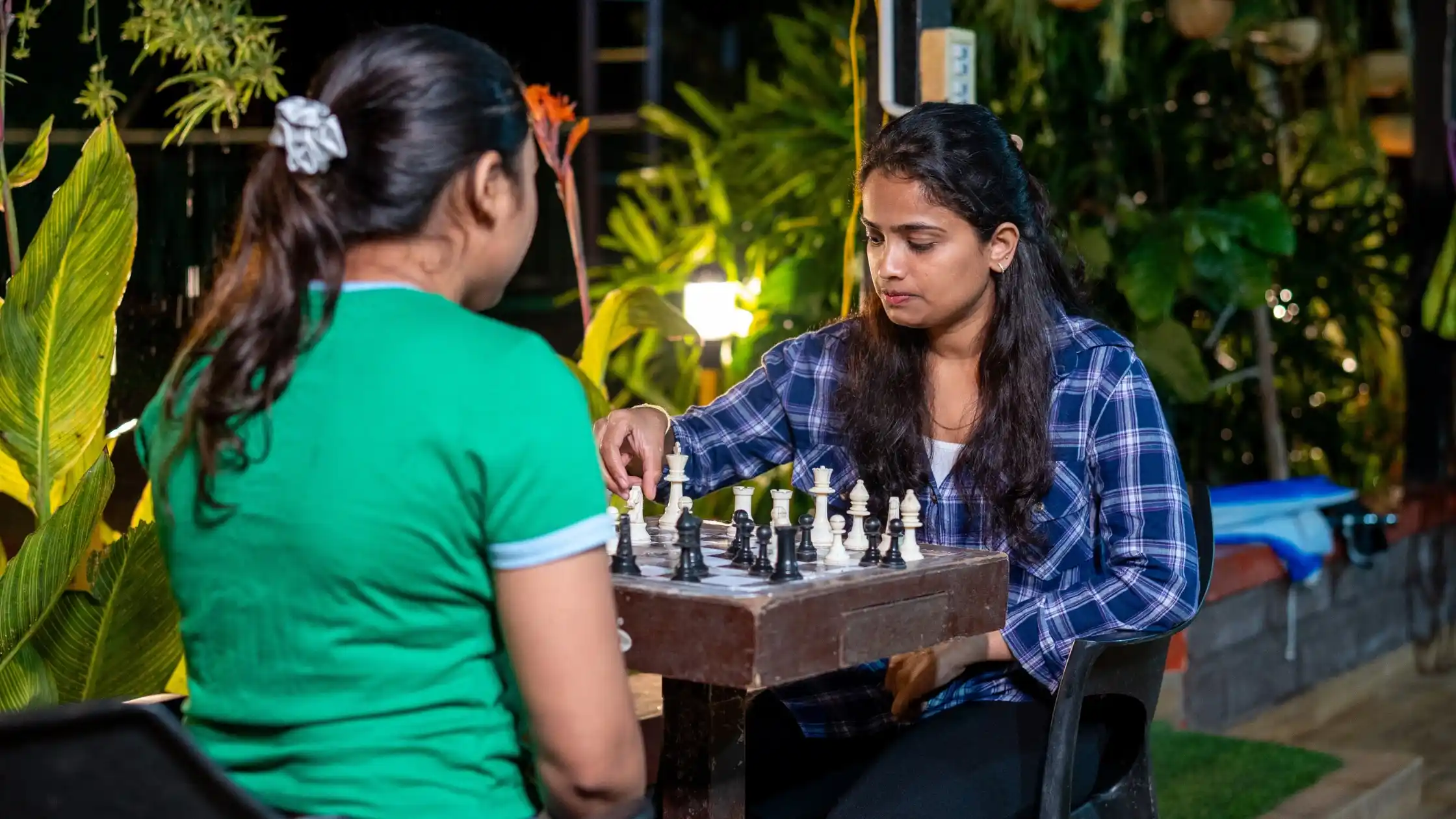 Guests Enjoying Indoor Chess at a Resort in Sakleshpur